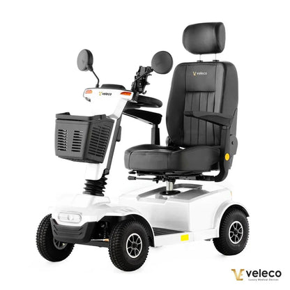 Electric Mobility Scooter Veleco Jumpy features a sleek design, comfortable padded seat, sturdy wheels, and a basket.