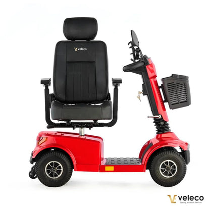 Electric Mobility Scooter Veleco Jumpy features a vibrant red body, comfortable black seat, and sturdy wheels.