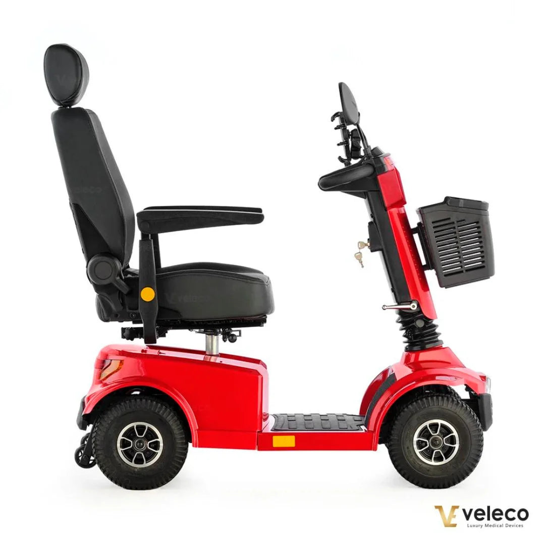 Electric Mobility Scooter Veleco Jumpy, features a sleek red design, comfortable seat, adjustable armrests, and storage basket.