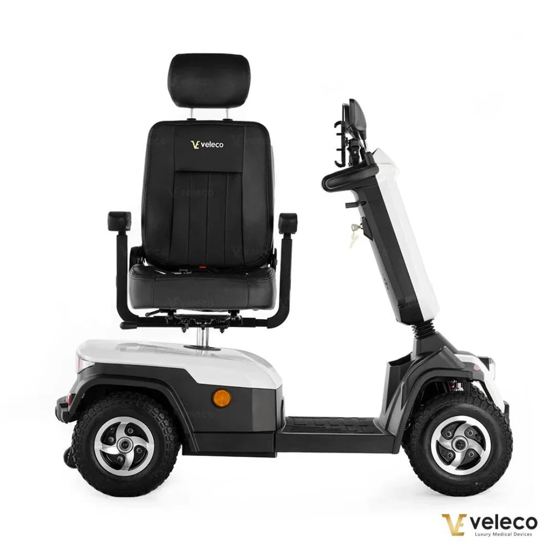 Electric Mobility Scooter Veleco Sharpy, featuring a sleek design, comfortable seat, and sturdy wheels for stability.