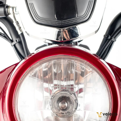 Electric Mobility Scooter Veleco Zt63 features a sleek red design, showcasing its stylish front headlight and chrome details.