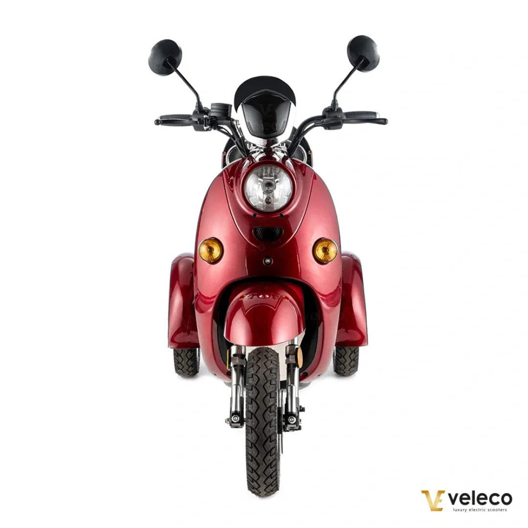 Electric Mobility Scooter Veleco Zt63 features a stylish red body, large front headlight, and sturdy design.