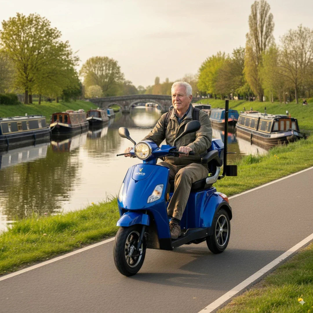 Veleco Draco – elderly man riding by canal