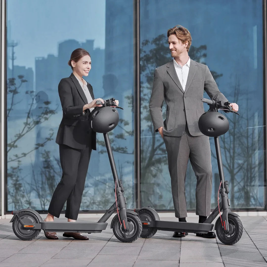 Electric Scooter Xiaomi 4 Pro 2nd Gen, sleek design, city commuters, stylish riders in business attire, modern urban backdrop.
