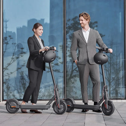 Electric Scooter Xiaomi 4 Pro 2nd Gen, sleek design, city commuters, stylish riders in business attire, modern urban backdrop.