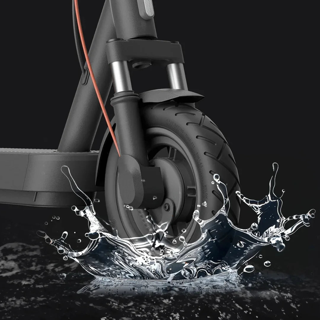 Electric Scooter Xiaomi 5 Max Gl features a sturdy front wheel with a splash of water, highlighting durability.