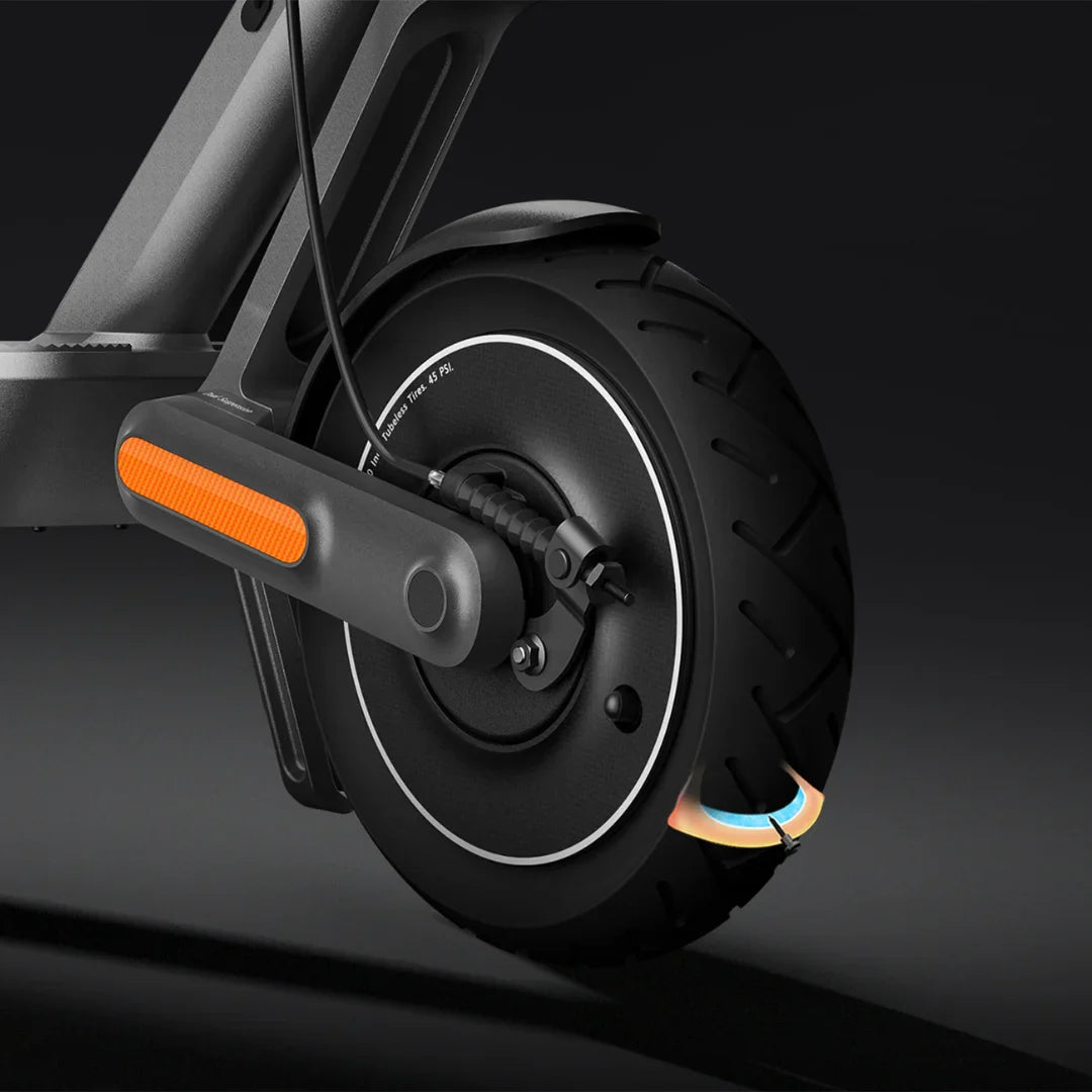 Electric Scooter Xiaomi 4 Ultra features a sleek design, sturdy tire, and a visible orange reflector for safety.