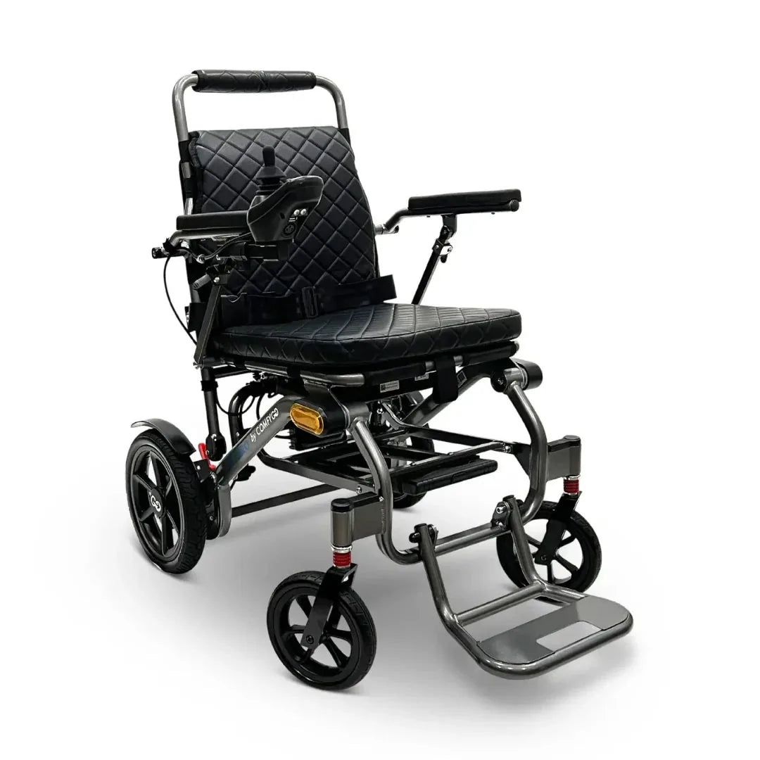 Electric wheelchair ComfyGO G5 / G5 Pro – front quarter view of black chair unfolded, showing footrest