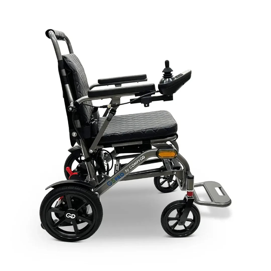 Electric wheelchair ComfyGO G5 / G5 Pro – side view of black chair unfolded, showing front and rear wheels