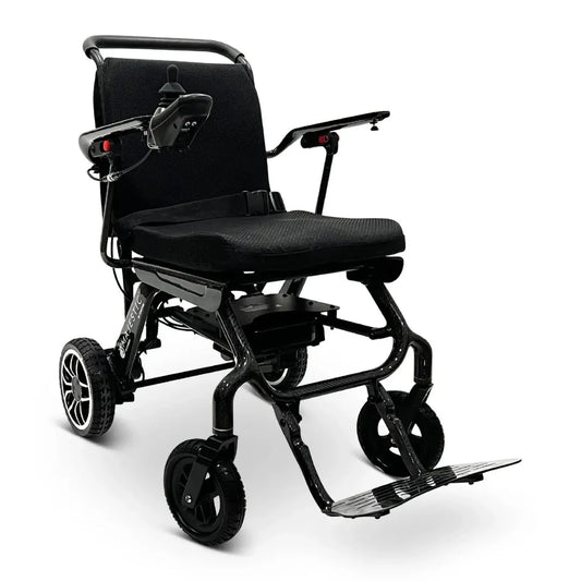 Electric wheelchair ComfyGO IQ-Carbon – front quarter view, unfolded, with joystick control on left armrest