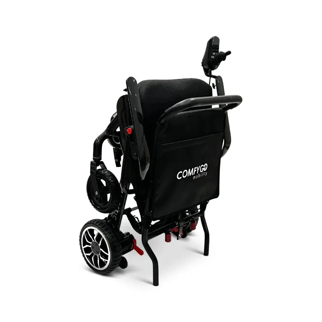Electric wheelchair ComfyGO IQ-Carbon – rear quarter view, folded vertically, showing ComfyGO logo on seat back
