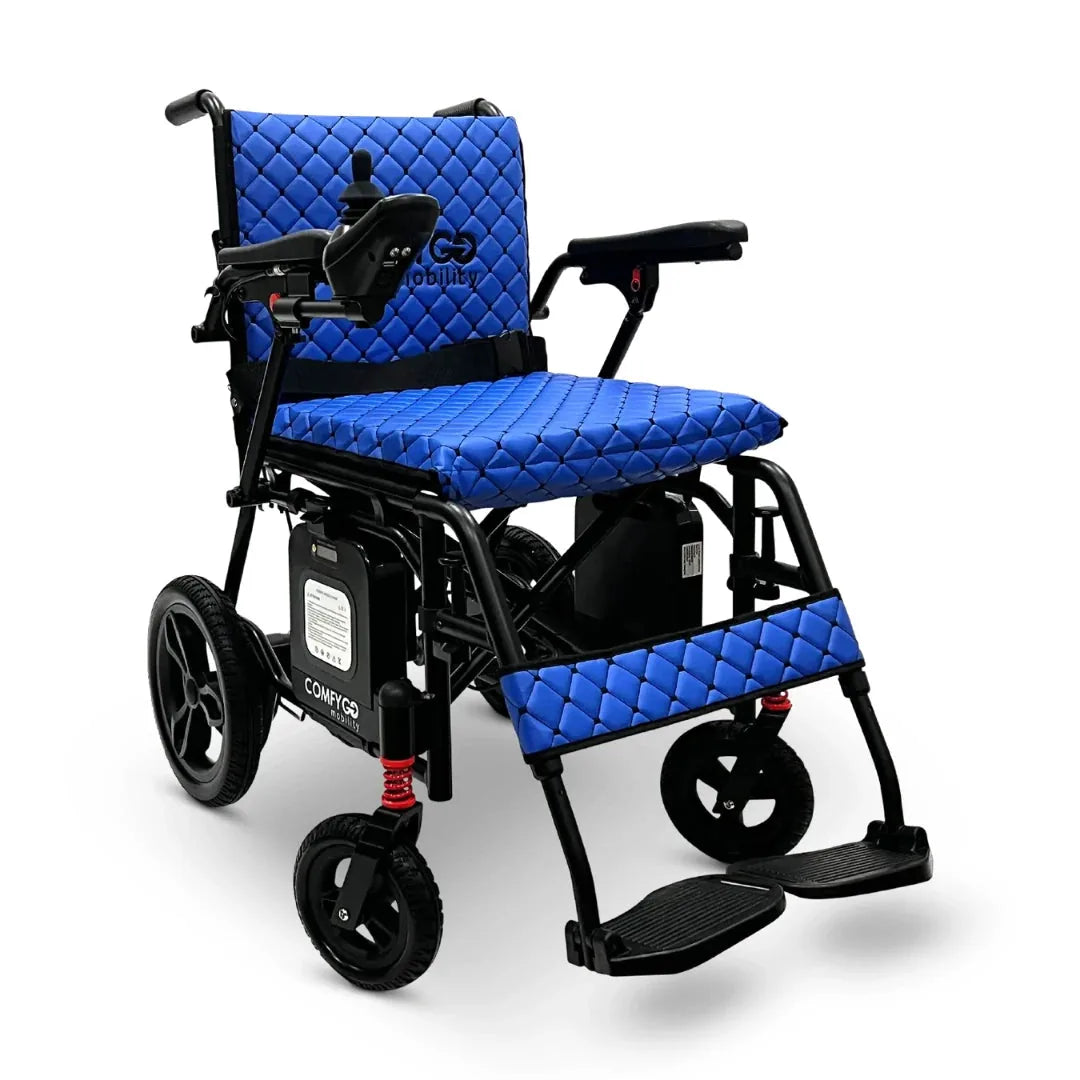 Electric wheelchair ComfyGO X7 – front three-quarter view, unfolded, with blue quilted seat and backrest