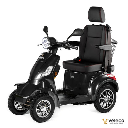 Veleco Faster – black four-wheel scooter with rear basket