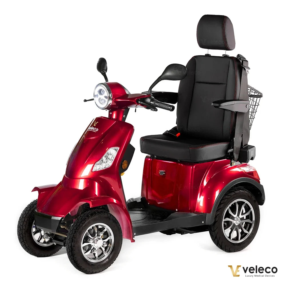 Veleco Faster – red four-wheel scooter with rear basket