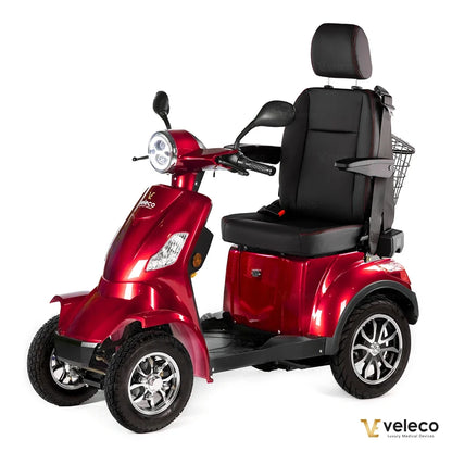 Veleco Faster – red four-wheel scooter with rear basket