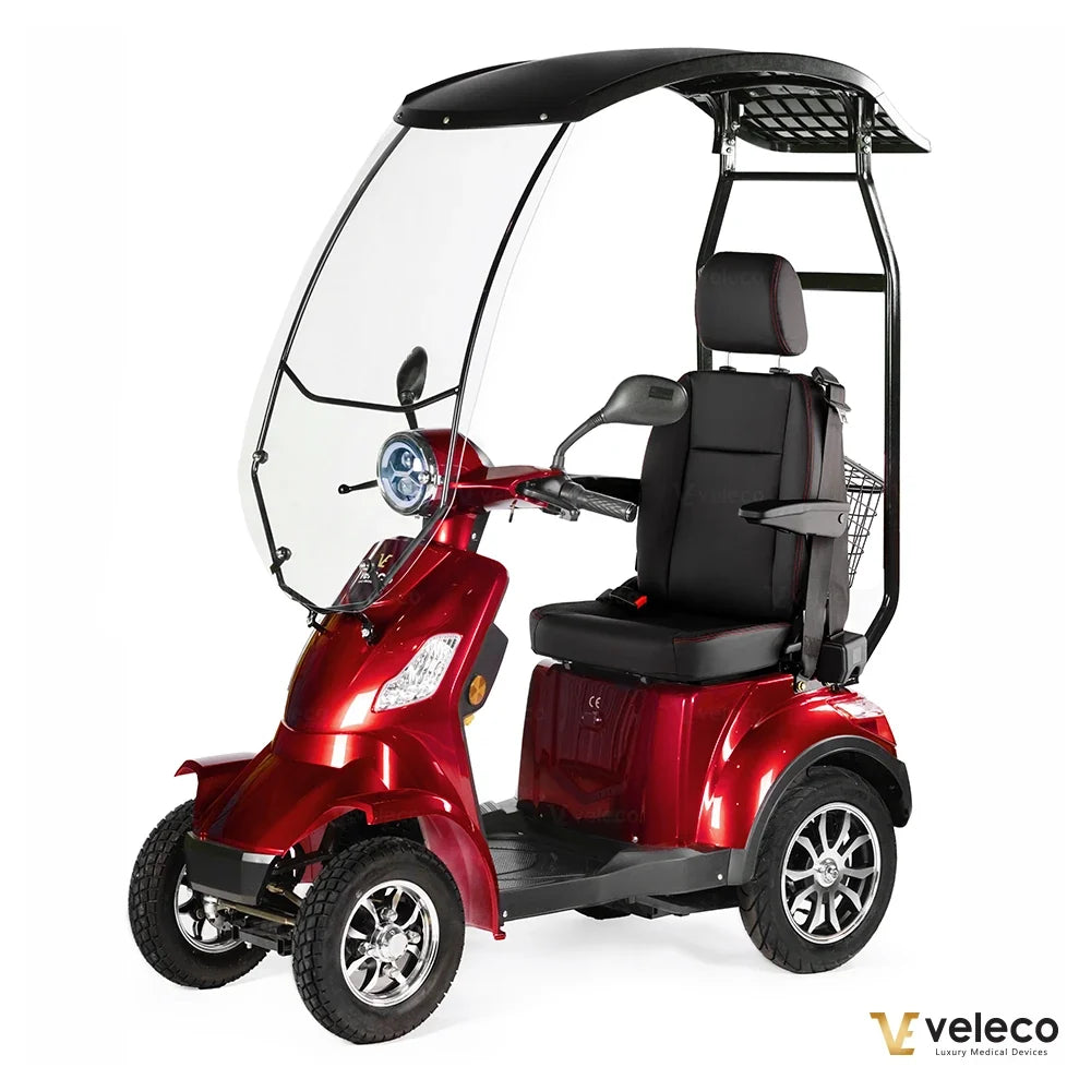 Veleco Faster – red four-wheel scooter with canopy