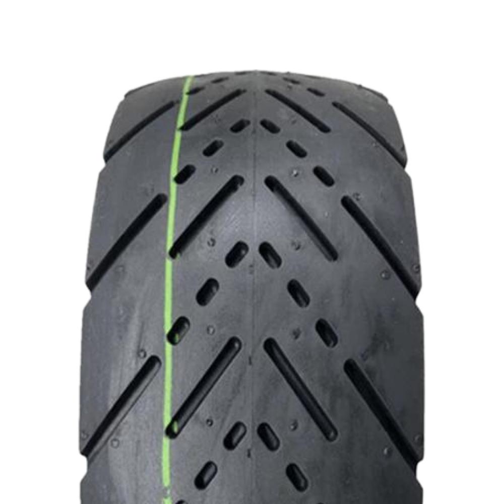 Outer Tires 90/65-6.5 – tread pattern close-up with green line