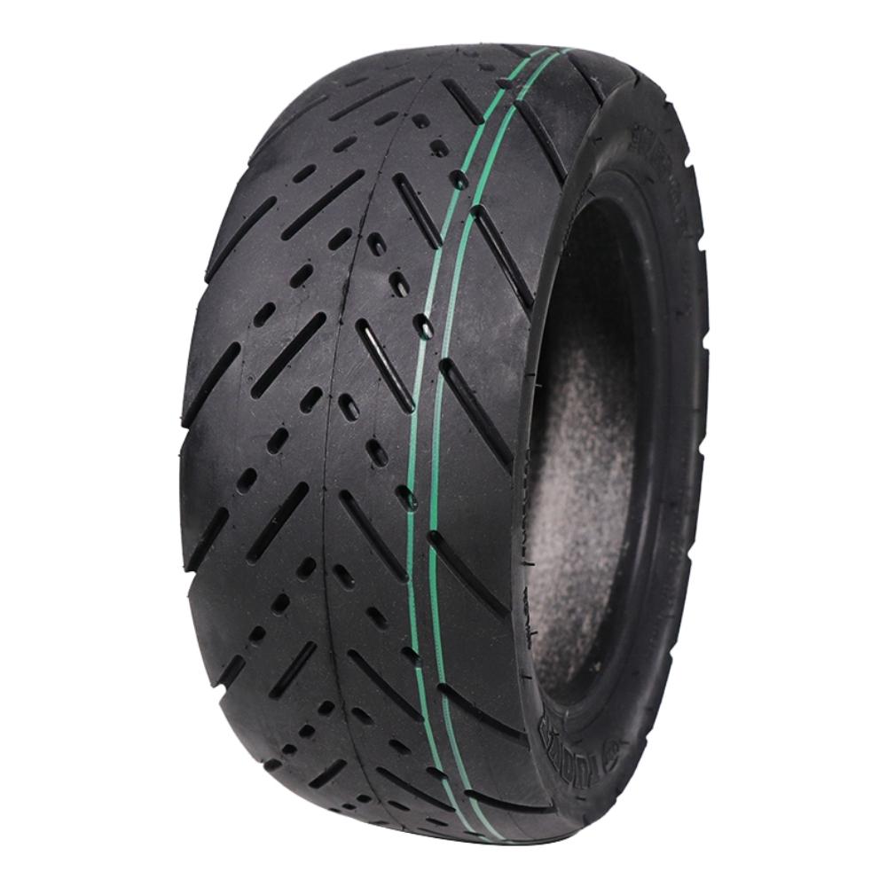 Outer Tires 90/65-6.5 – angled view of tire with green stripe