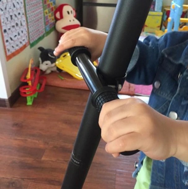 Children's Handlebar for Electric Scooter – child's hands on handlebar